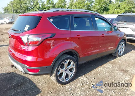 2017 Ford Escape Titanium z USA, uszkodzony, nr VIN 1FMCU0J92HUA81405